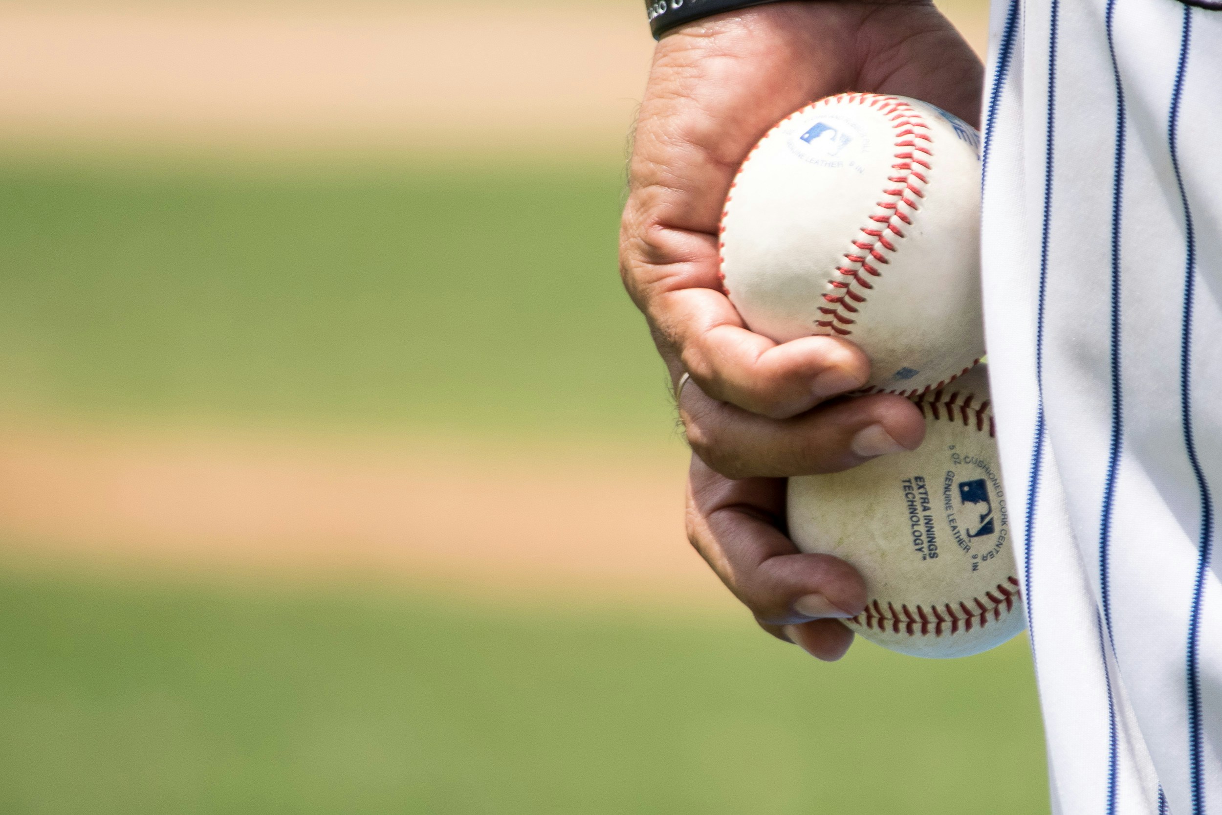 Coach reviewing baseball performance data